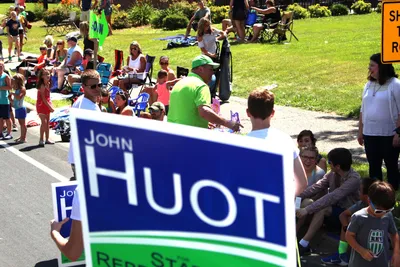 John Huot interacting with parade attendees